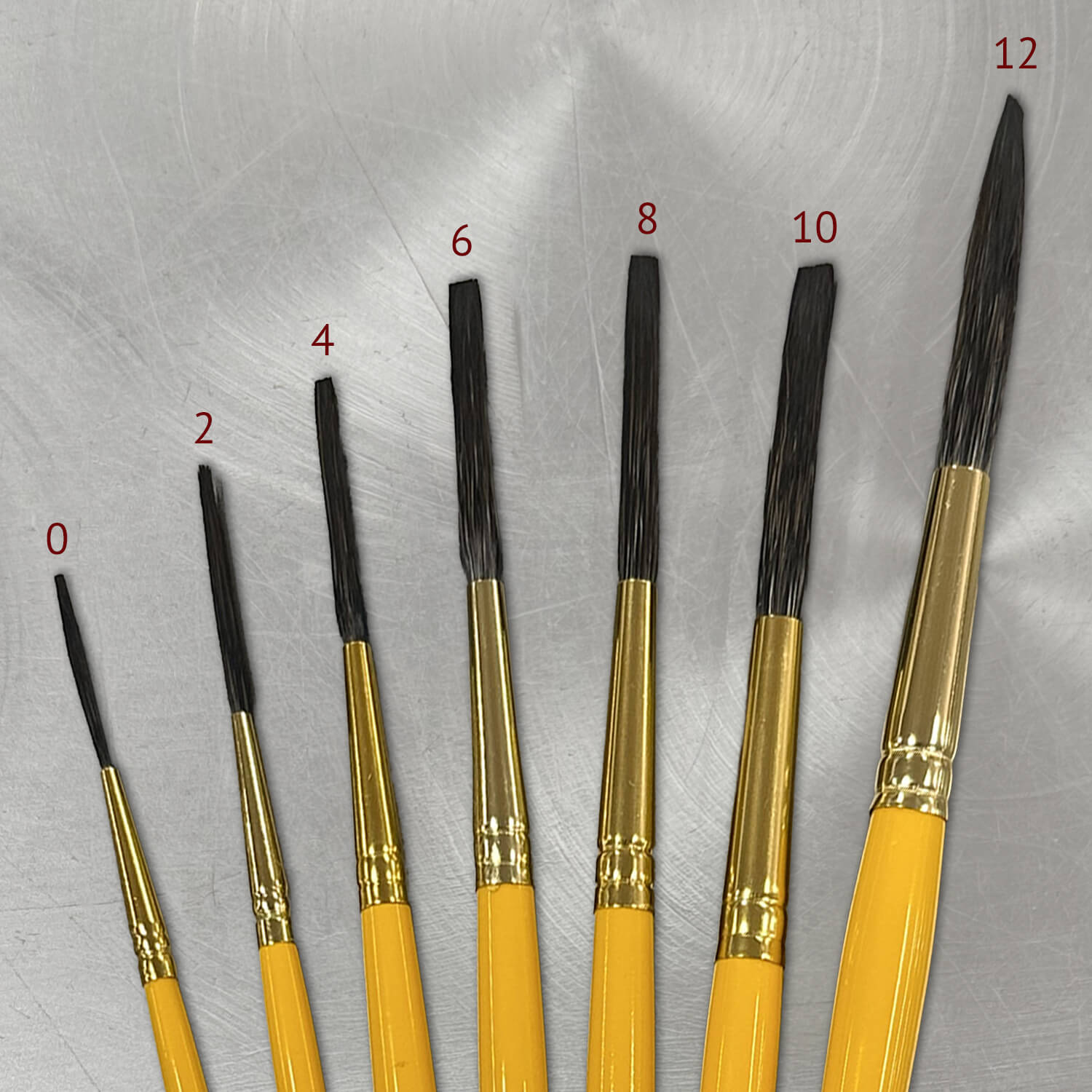 Von Dago Pineapple Express lettering quills, pinstriping supplies, Kafka brushes, Mack pinstriping brushes, and Mack lettering brushes.