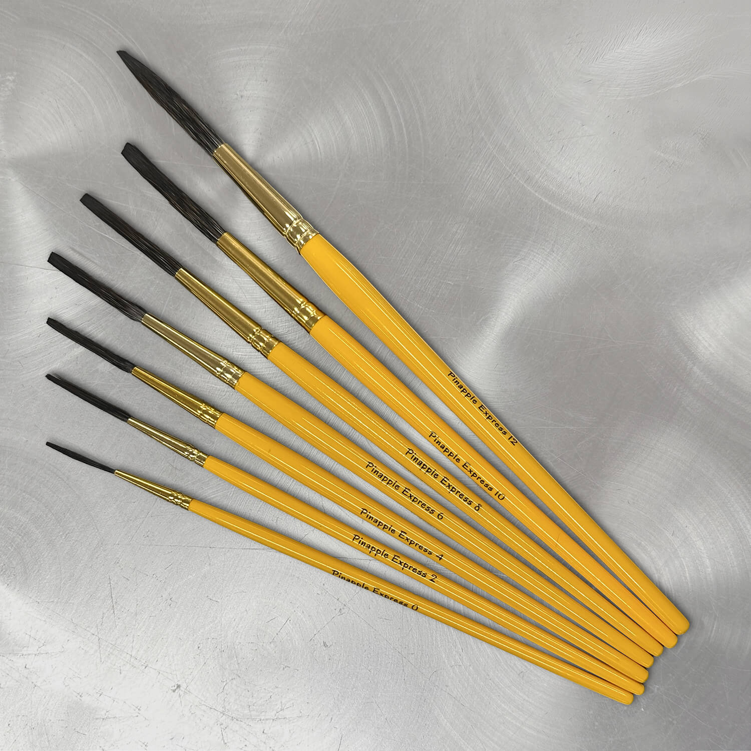 Von Dago Pineapple Express lettering quills, pinstriping supplies, Kafka brushes, Mack pinstriping brushes, and Mack lettering brushes.